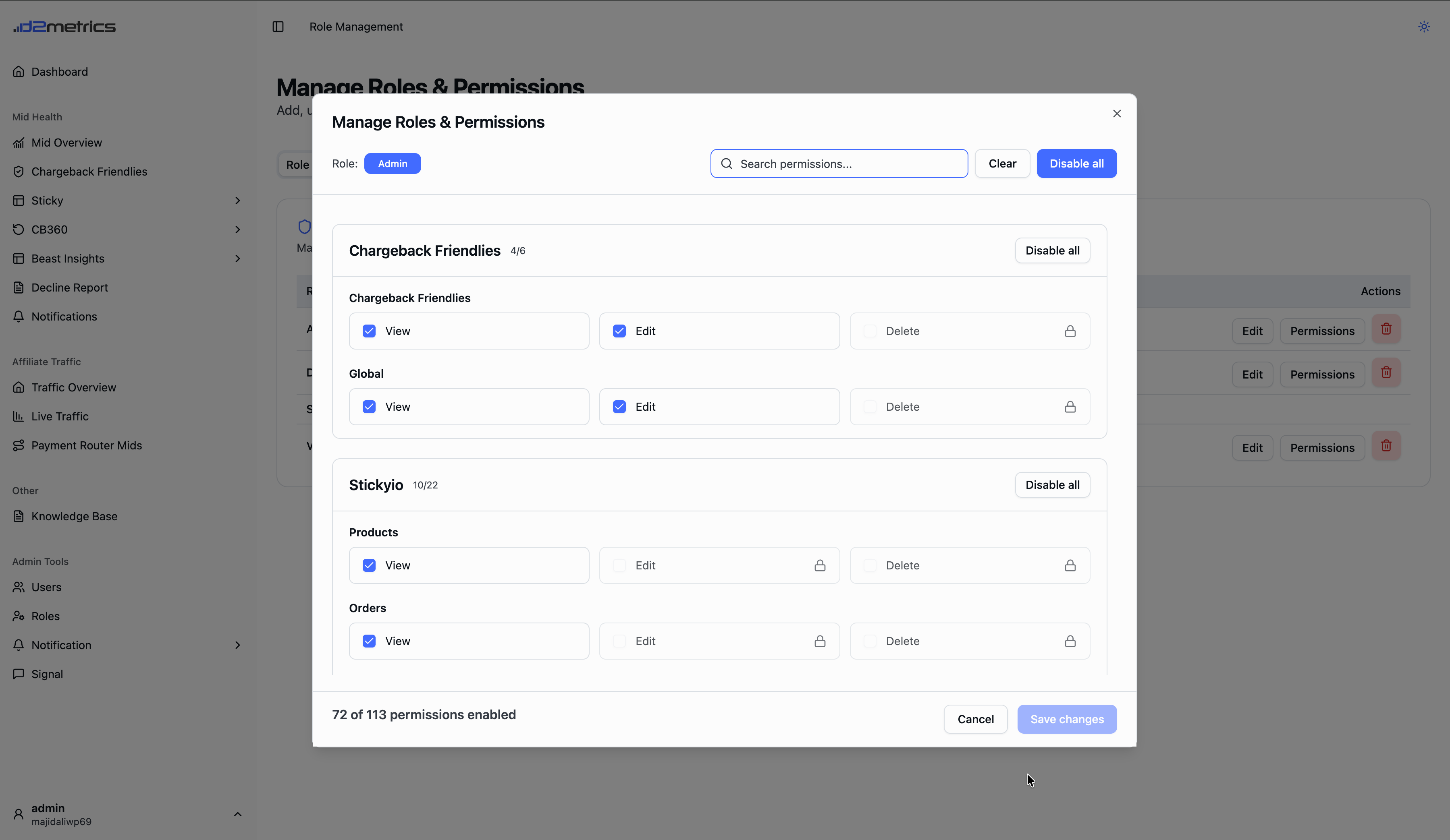 D2Metrics role management modal showing granular view, edit, and delete permissions broken down by module